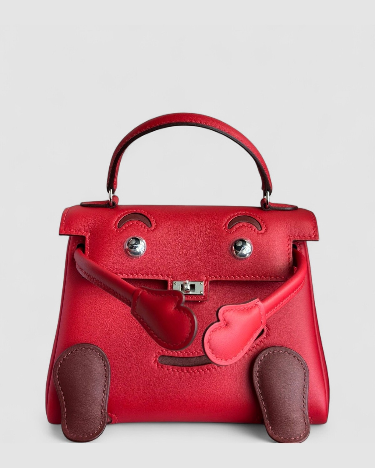 Hermes Kelly Doll Rouge Radieux Swift Palladium Hardware front view