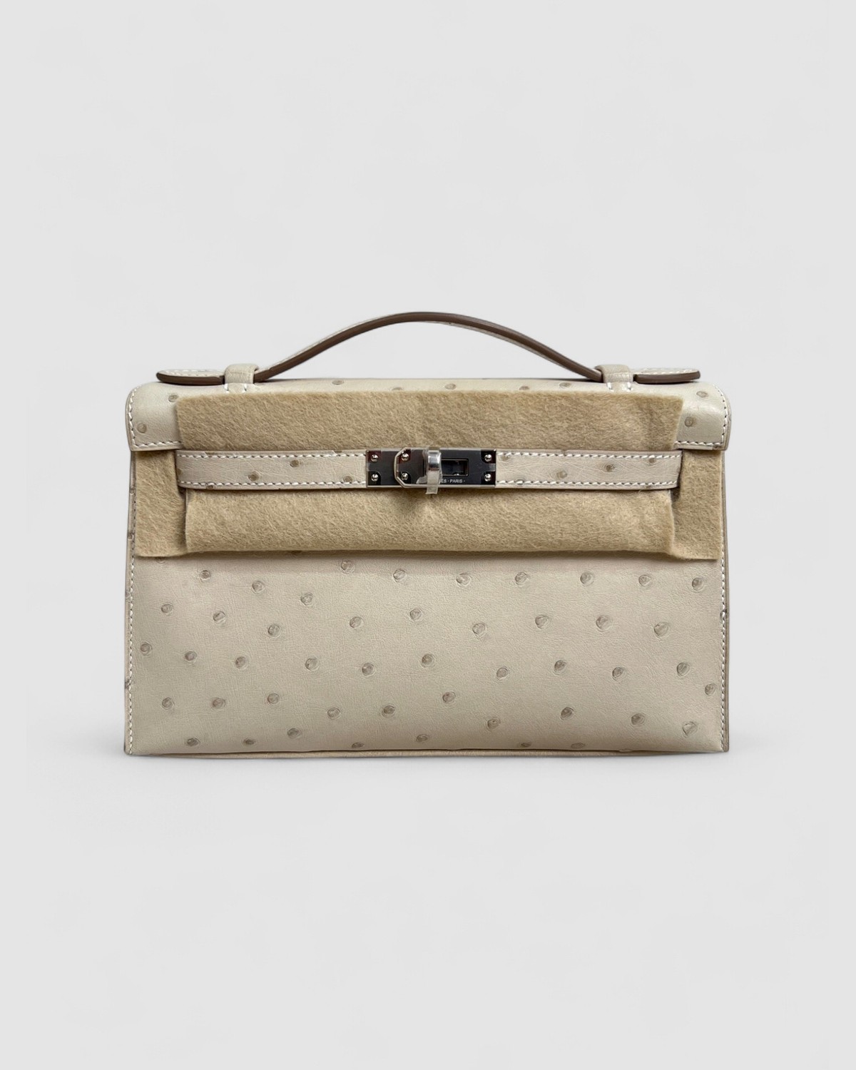 Hermes Kelly Pochette KP Craie Ostrich Palladium Hardware front view